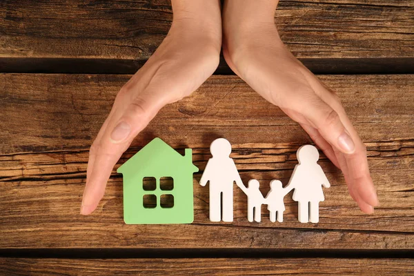 depositphotos_291425160-stock-photo-woman-holding-hands-near-figures (1)